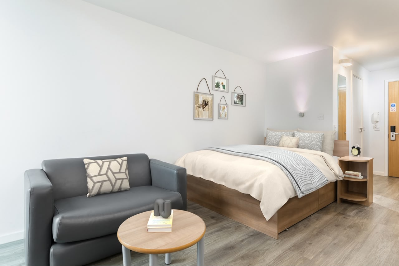 RE Studio virtual staging, studio bedroom with seating area